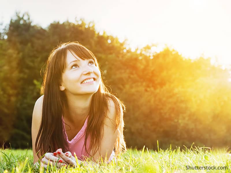 Woman in grass.